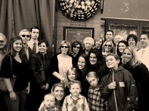 Three generations of Reillys at a wreath laying ceremony